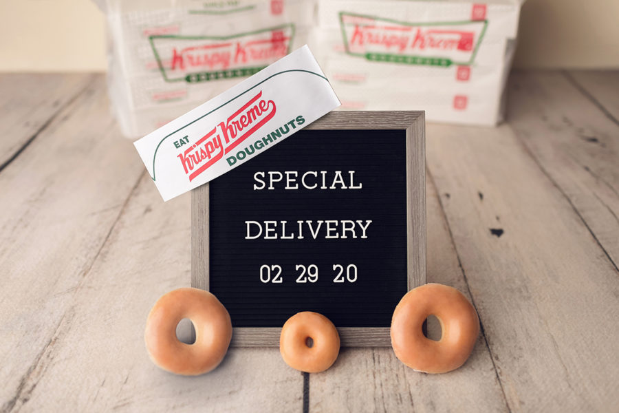 Krispy Kreme with sign that says Special Delivery